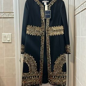 It’s Oscar de la Renta Size:it is very gorgeous.us 10; Brand New, never wear.